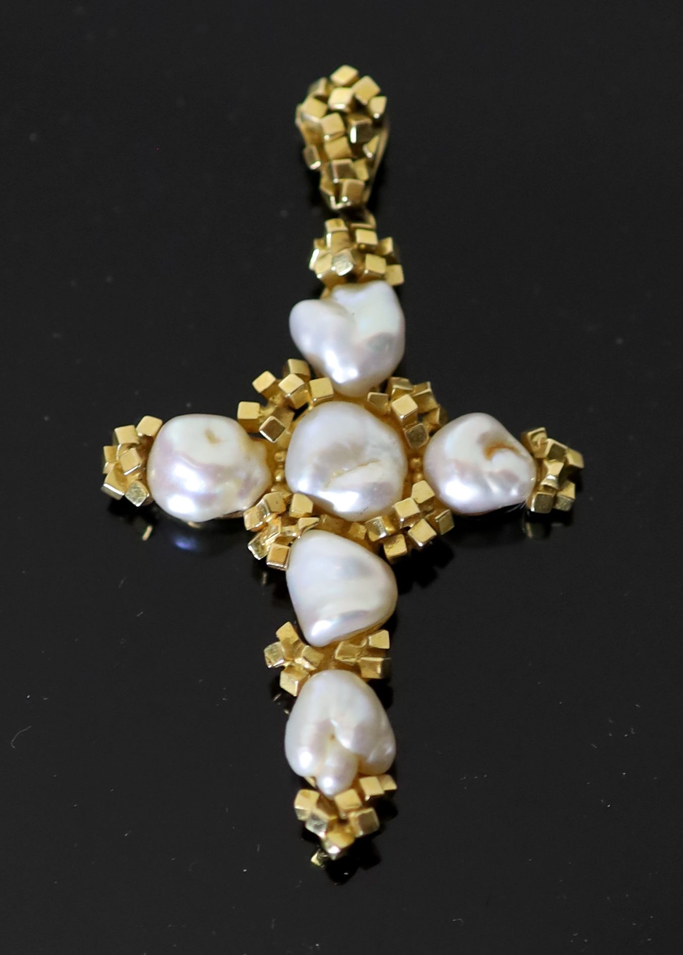 A 20th century continental 18ct gold and six stone baroque pearl set cross pendant,